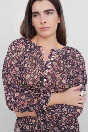 BLUSA SEMITRANSPARENTE ESTAMPADA