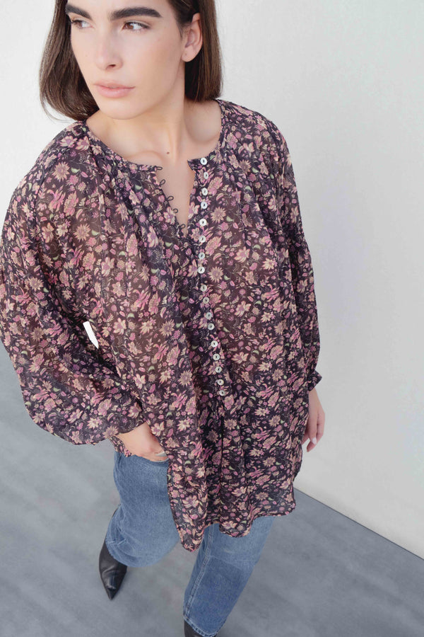 BLUSA SEMITRANSPARENTE ESTAMPADA